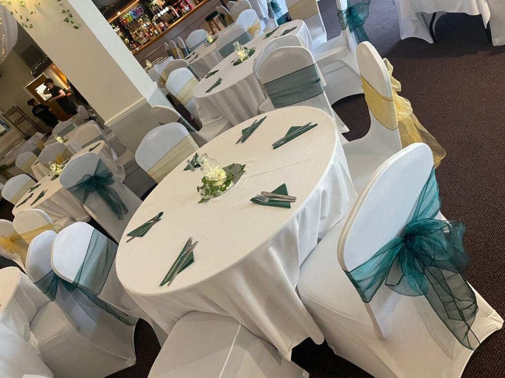 Elegant banquet hall with decorated round tables