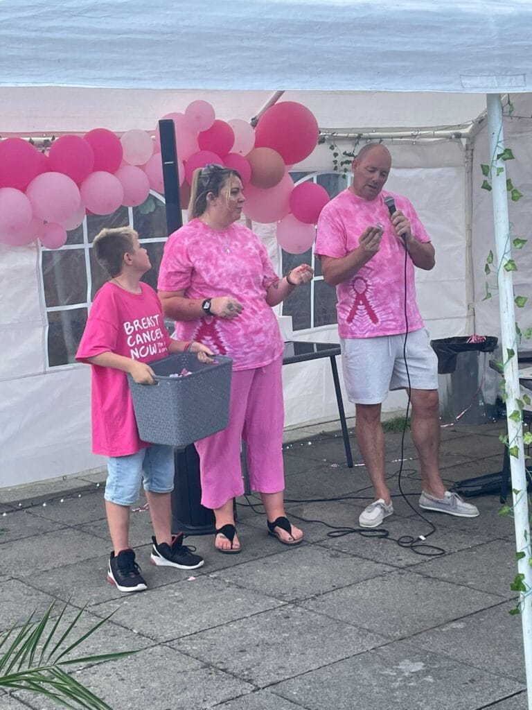 People hosting a breast cancer fundraising event