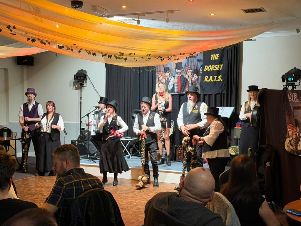 Folk band performing on stage for audience